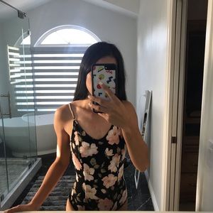 Floral criss cross back bodysuit